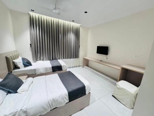 family hotel with pool in serilingampalle, hyderabad - isha - luxury rooms