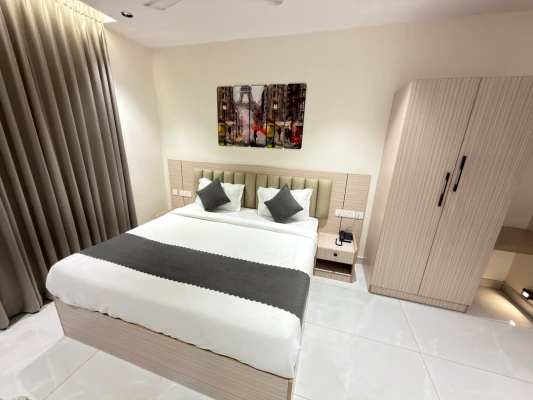 hotel with party hall in serilingampalle, hyderabad - isha - luxury rooms