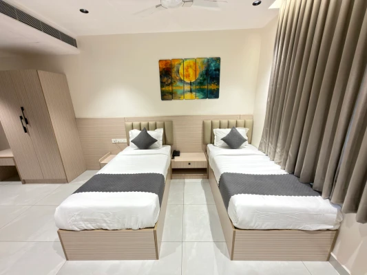 family hotel with pool in serilingampalle, hyderabad - isha - luxury rooms