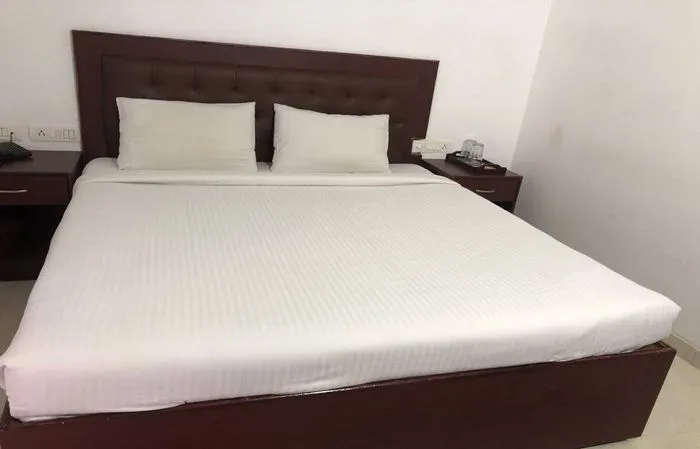 budget hotel in gachibowli, hyderabad - limestone luxury rooms