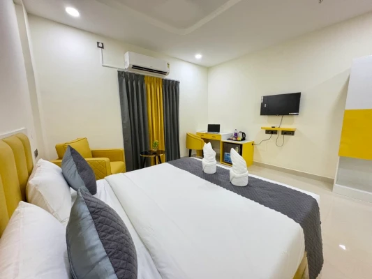 hotel room booking in gachibowli, hyderabad - yellow sapphire hotel dlf cyber city