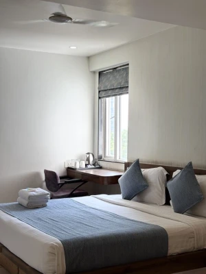 hotel with swimming pool in bombay hospital square ring road, indore - hotel blue marine