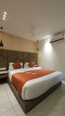 hotel with swimming pool in bombay hospital square ring road, indore - hotel carnival