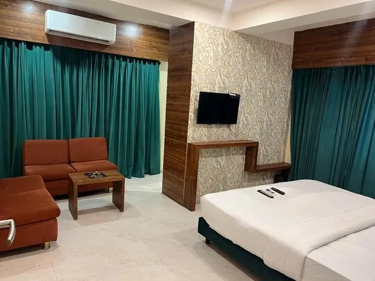 hotel with party hall in tukoganj, indore - hotel enigma