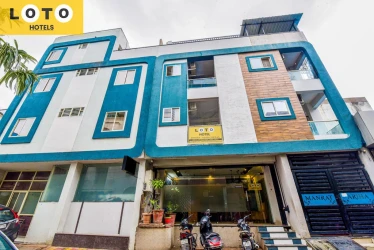 hotel with gym in bangali square indore, indore - loto hotel bangali square