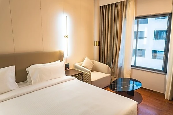 hotel with swimming pool in vishnu puri, indore - pride plaza indore