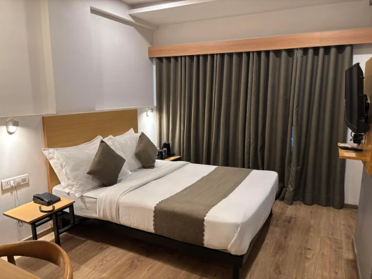 family hotel with pool in bombay hospital square ring road, indore - the byke business landmark c21 mall indore