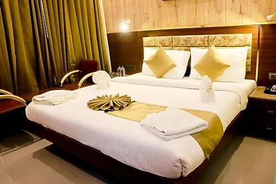 hotel near indore airport - the clan hotel