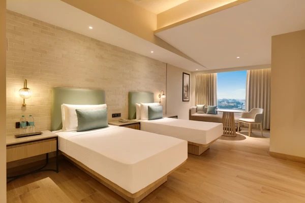 family hotel with pool in naudra bridge, jabalpur - lemon tree premier jabalpur