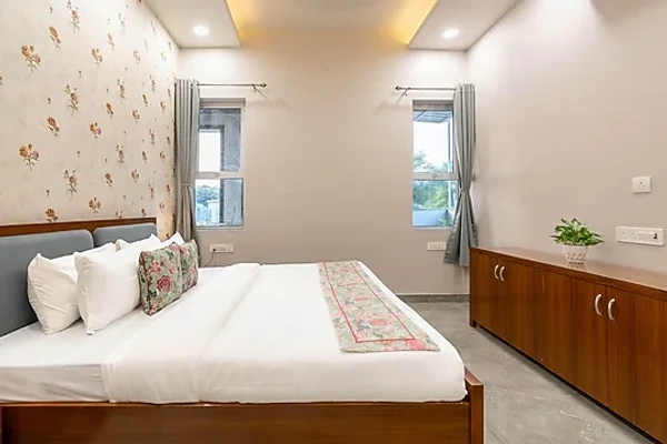 hotel with swimming pool in amber tower, jaipur - elivaas jamun farms 2bhk retreat with pvt pool garden & balcony jaipur