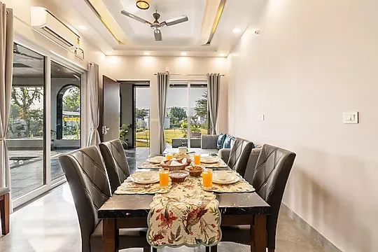 hotel with swimming pool in amber tower, jaipur - elivaas jamun farms 2bhk retreat with pvt pool garden & balcony jaipur