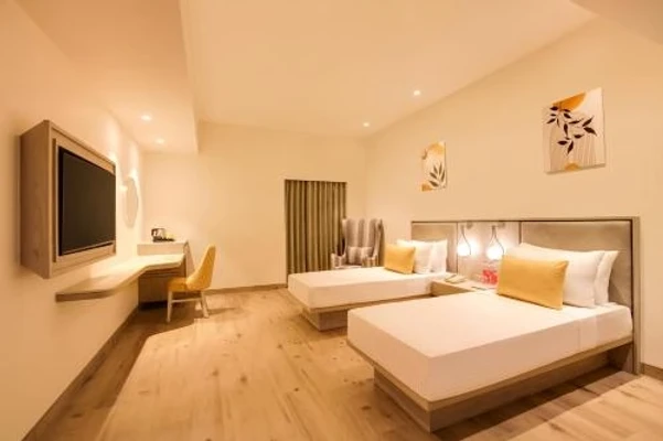 hotel in dwarka bypass road, jamnagar for family - lemon tree hotel jamnagar