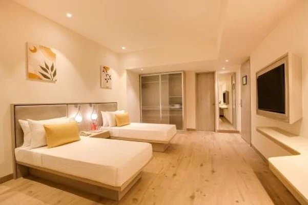 family hotel with pool in dwarka bypass road, jamnagar - lemon tree hotel jamnagar