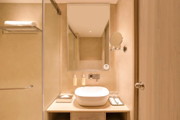 hotel with swimming pool in dwarka bypass road, jamnagar - lemon tree hotel jamnagar