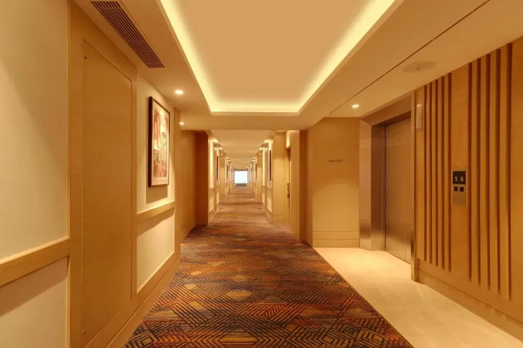 hotel with free parking in railway station road, jhansi - lemon tree hotel jhansi