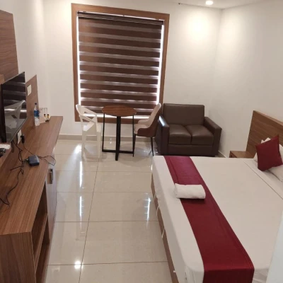 sn park road, kannur hotel booking - faaz international