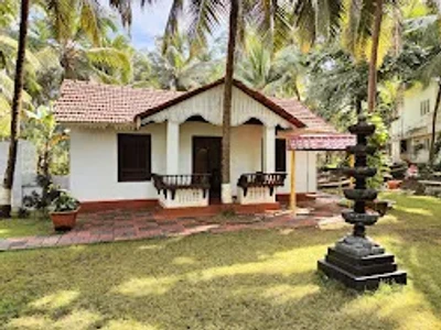 hotel with swimming pool in thottada beach road, kannur - malabar beach resort