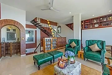 hotel with bar in nahari, kasauli - elivaas ivory ridge 9 bhk cliffside villa with picturesque view