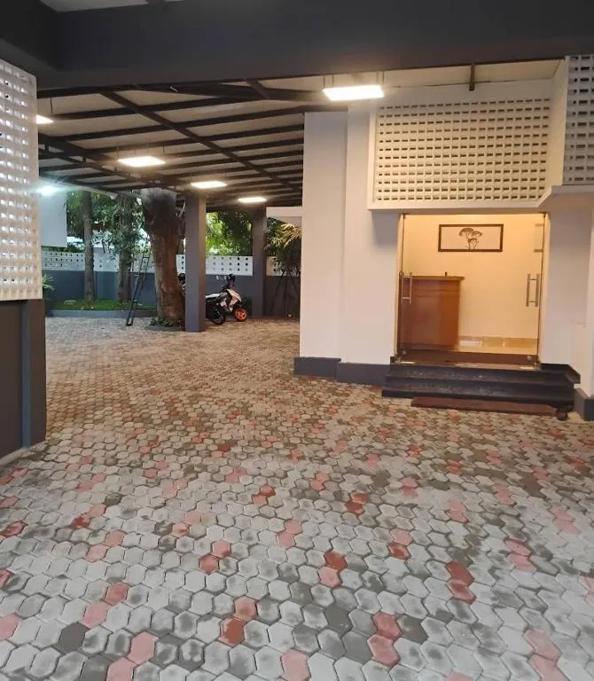 family hotel with pool in perumanoor, kochi - ats homes by maya str