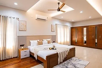 hotel with free parking in kaloor, kochi - elivaas valiyaveetil mansion 5bhk mansion with pvt pool & theatre