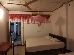 service apartment with kitchen in light house road, kovalam - spice green serviced apartment