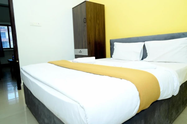 hotel with party hall in deralakatte, mangalore - aradhya inn deralakatte