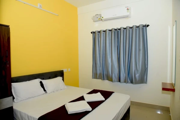 hotel with gym in deralakatte, mangalore - aradhya inn deralakatte