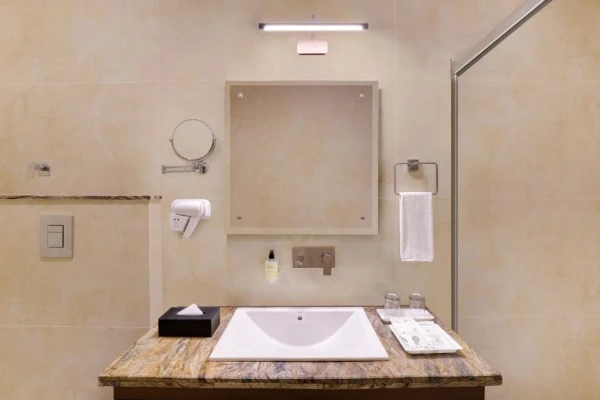 hotel with swimming pool in dal lake, mcleodganj - lemon tree hotel mcleodganj