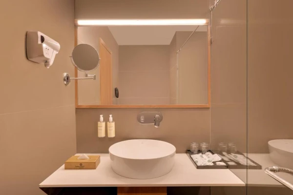 hotel with free parking in bela, morbi - lemon tree hotel morbi