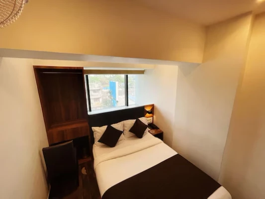 flexible hotel booking in hotel hilton suites mumbai