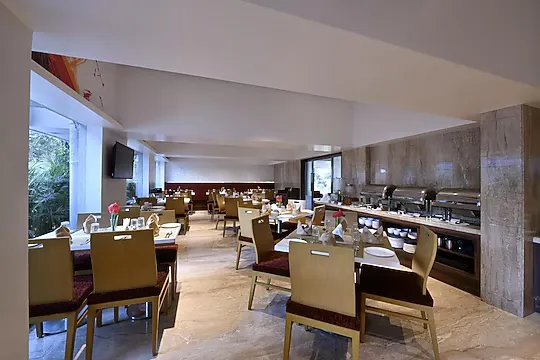 hotel with party hall in andheri east, mumbai - hotel leafio marigold