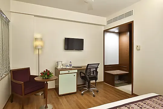 hotel with gym in andheri east, mumbai - hotel leafio marigold