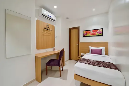 family hotel with pool in saki naka, mumbai - hotel leafio sakinaka