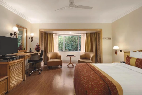 family hotel with pool in juhu beach, mumbai - ramada plaza by wyndham palm grove
