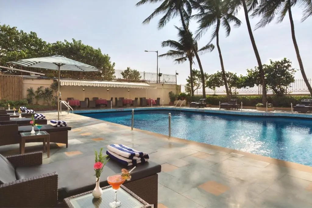 hotel with gym in juhu beach, mumbai - ramada plaza by wyndham palm grove