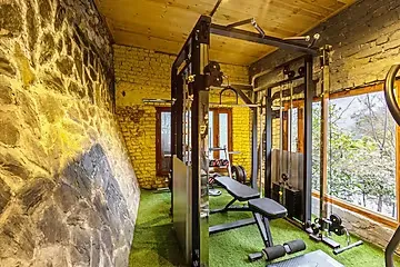 hotel with bar in bhediyana, mussoorie - elivaas zephyr kumaon cottage hillside retreat with common pool, gym & restaurant