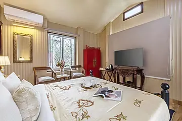 hotel room booking in bhediyana, mussoorie - elivaas zephyr sierra 2 bhk hillside villa with common pool, gym & restro