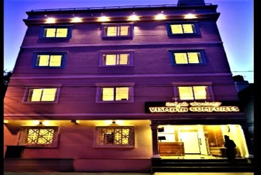 hotel with gym in nazarbad, mysore - vismaya comforts