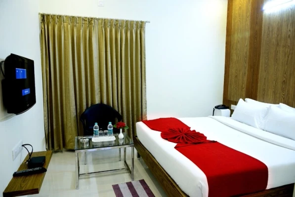 hotel with meeting room in nazarbad, mysore - vismaya comforts