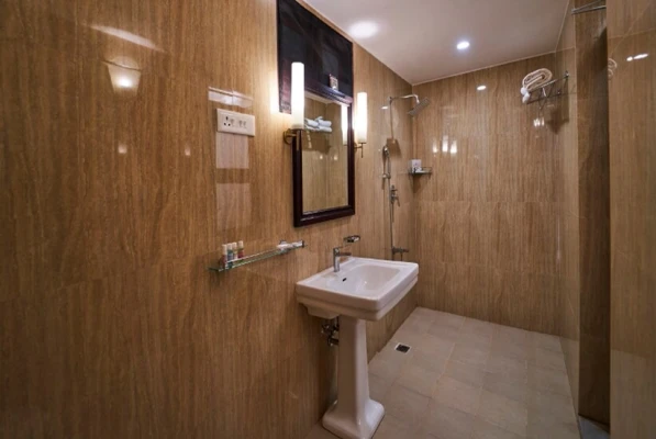 hotel with bar in nazarbad, mysore - vismaya comforts