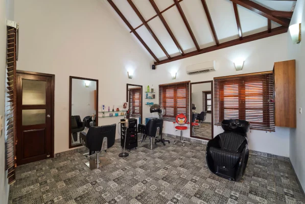 family hotel with pool in nazarbad, mysore - vismaya comforts