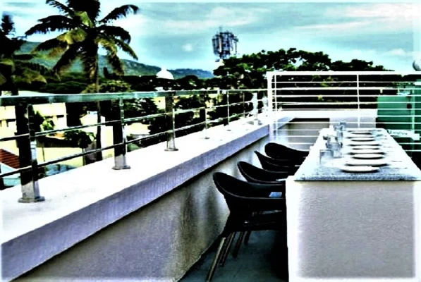 hotel with party hall in nazarbad, mysore - vismaya comforts