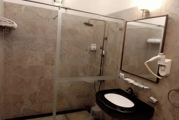 hotel with banquet hall in nazarbad, mysore - vismaya comforts