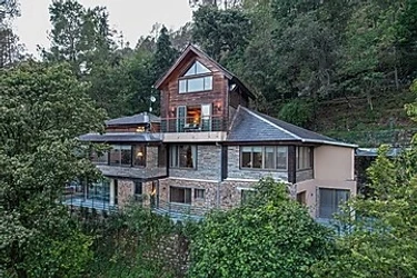 hotel with free parking in sukha, nainital - elivaas blushing pines stunning 3-bhk hillside getaway with attic & indoor pool