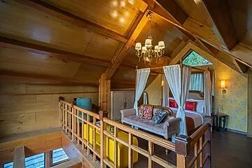hotel with free parking in sukha, nainital - elivaas blushing pines stunning 3-bhk hillside getaway with attic & indoor pool