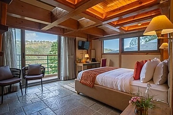 family hotel with pool in sukha, nainital - elivaas blushing pines stunning 3-bhk hillside getaway with attic & indoor pool