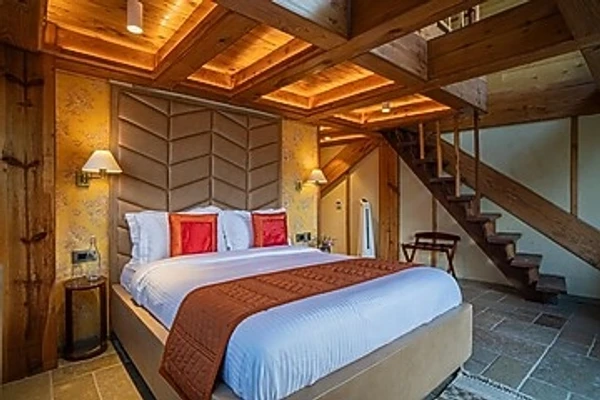 hotel with free parking in sukha, nainital - elivaas blushing pines stunning 3-bhk hillside getaway with attic & indoor pool