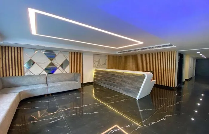 family hotel with pool in ansal golf link, noida - ace iconic hotel