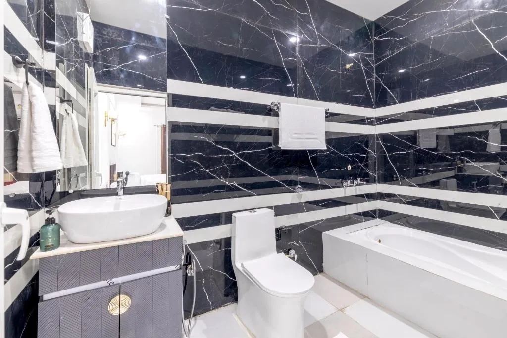 hotel with swimming pool in sector 150, noida - alaya stays 3-bhk rathore farm with pvt pool & lush garden