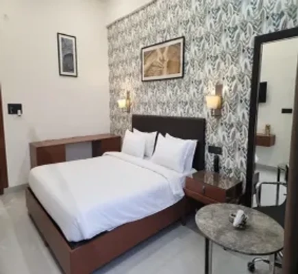 hotel with swimming pool in sector 16, noida - anandam residency